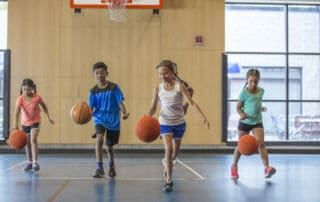 Dribbling Basketballs Up the Court